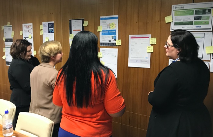 Workshop attendees participating in competitive analysis activity
